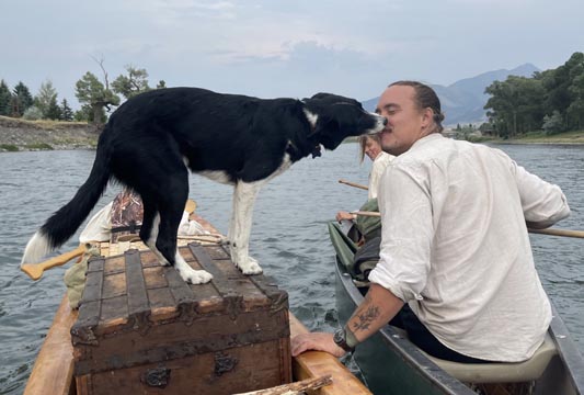 Shadow dog gives Mark a kiss.