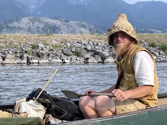 Sam paddles the Yellowstone River.
