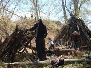 Wood debris lean-to and wiki-up.